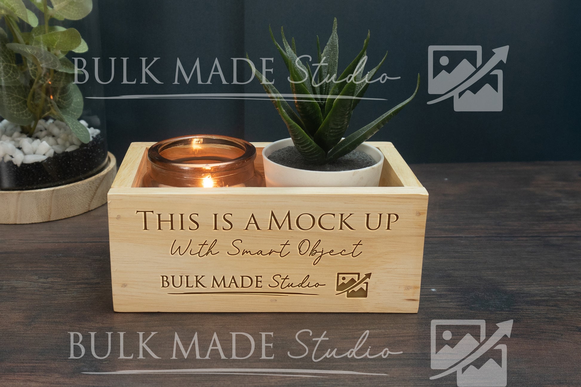 Wooden box with a candle holder and small plant, branded 'Bulk Made Studio'.